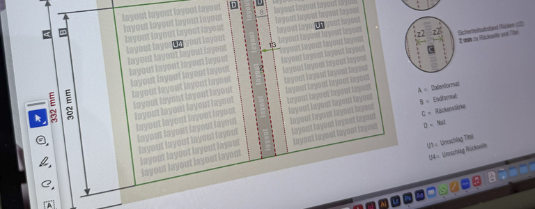 Abbildung eines Monitors auf dem ein Datenblatt für die Druckerei zu sehen ist